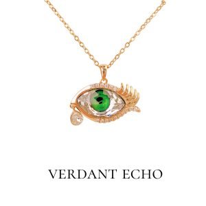 Synthetic white crystal eyes on a golden necklace